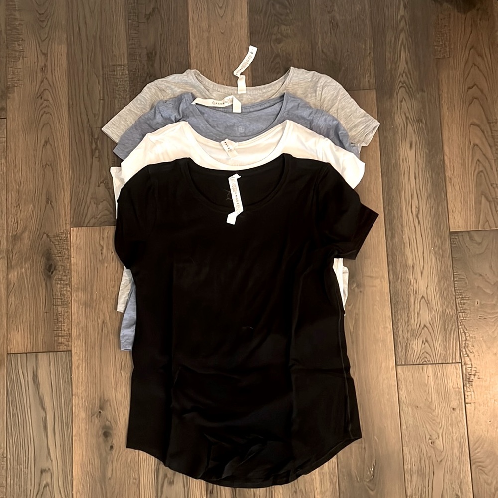 8 Lululemon Love Crew tees in like new condition!